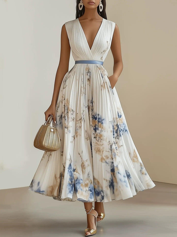 Birgit | Plissiertes Chiffon-Midikleid mit floralem Muster in Weiß und V-Ausschnitt