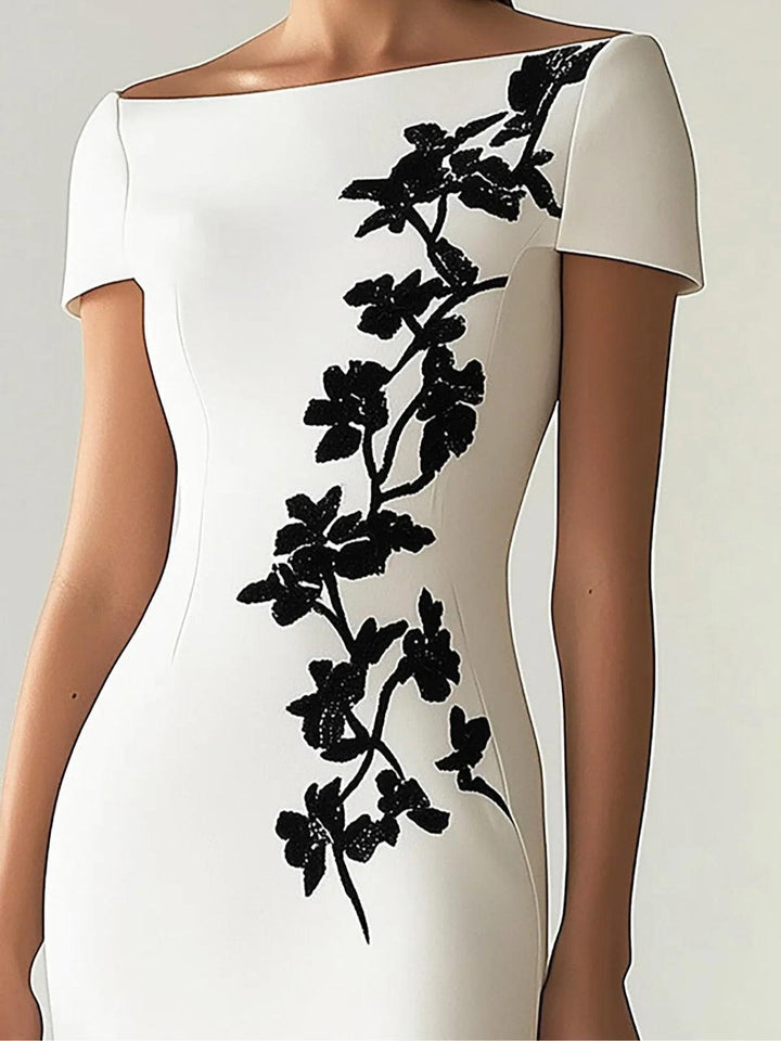 Heike | Elegantes Midikleid mit floralem Muster und U-Boot-Ausschnitt